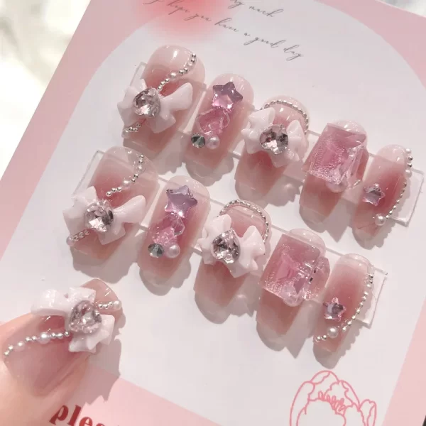 24 pieces of press on nails decorated with butterfly flowers. These luxury acrylic press-on nails are adorned with rhinestones and can be easily removed. They come with glue for easy application. - Image 6