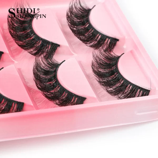 Achieve a natural and voluminous eye lash look with these 5 pairs of Russian strip lashes. These false eyelashes are made from faux 3D mink and are carefully handmade to give you fluffy lashes. Perfect for your makeup routine. - Image 2