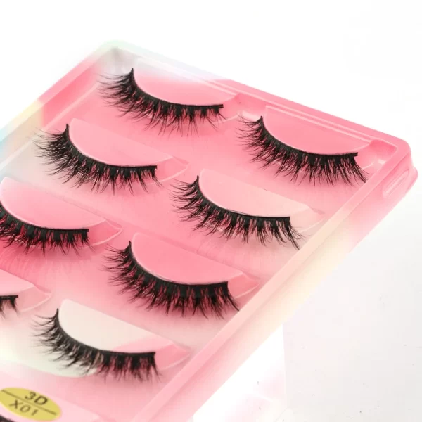 Achieve a natural and voluminous eye lash look with these 5 pairs of Russian strip lashes. These false eyelashes are made from faux 3D mink and are carefully handmade to give you fluffy lashes. Perfect for your makeup routine. - Image 4