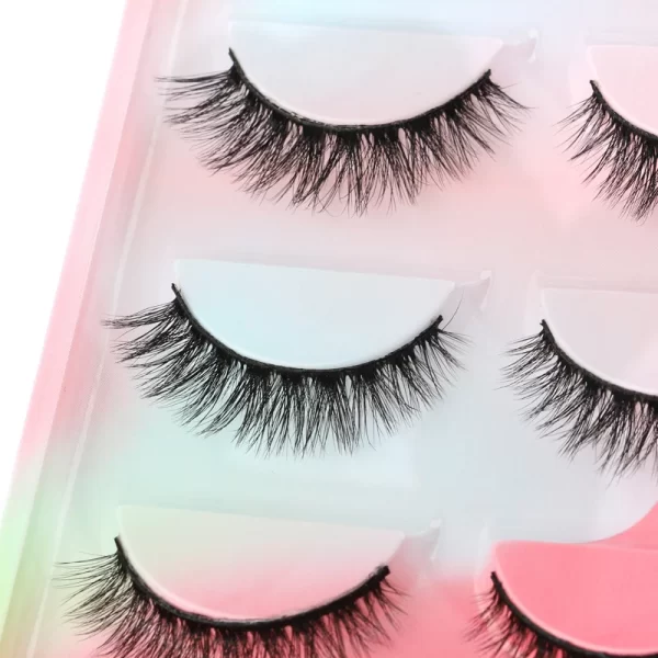 Achieve a natural and voluminous eye lash look with these 5 pairs of Russian strip lashes. These false eyelashes are made from faux 3D mink and are carefully handmade to give you fluffy lashes. Perfect for your makeup routine. - Image 5